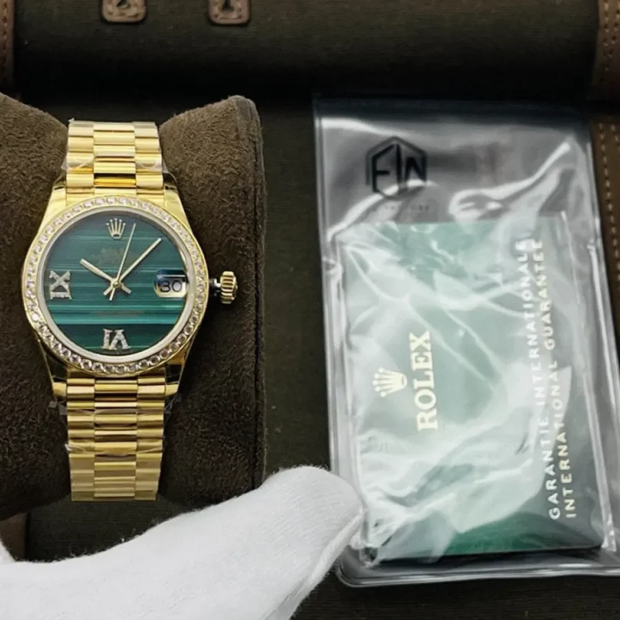 Rolex Oyster Perpetual Thickness: 11mm Diameter: 31mm